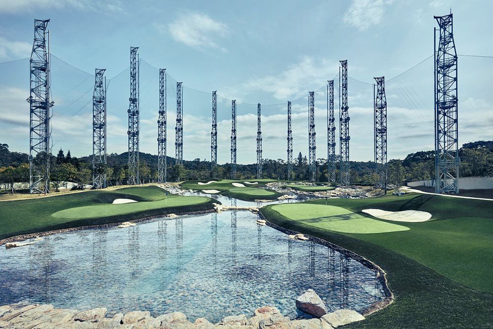 Detroit and all of Michigan Synthetic grass golf course with water and tall metal towers